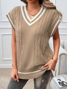 Close-up of khaki V-neck knit vest featuring cable knit texture and white striped edges