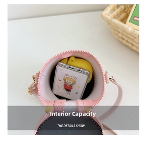 Internal view of pink leather girls bucket bag showing storage capacity for small items