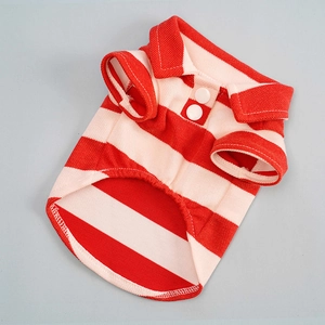 Detail view of red and white striped dog polo shirt made of breathable pique cotton
