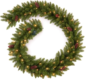 Detail of 9FT Christmas garland with realistic pine cones and warm LED lights