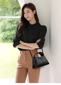 Elegant black lychee textured leather square crossbody bag with stylish wide handle strap