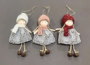 Detail of handmade Christmas angel ornaments with knit hats, felt fabric and metal bells