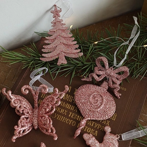 Pink glitter Christmas tree ornaments set with star, butterfly and crown shapes