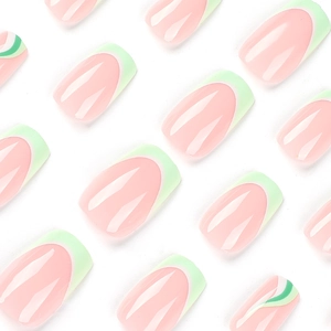Green and white wavy French press on nails with soft nude base in almond square shape