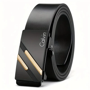 Detail view of the black leather belt with gold and black automatic buckle and logo