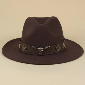 Close-up of western wool fedora featuring leather band and silver bull head metal emblem