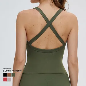 Olive green ribbed yoga sports bra featuring a criss-cross open back design