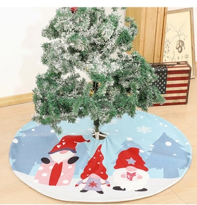 Detail of Christmas tree skirt featuring festive gnome prints and snowflakes decoration