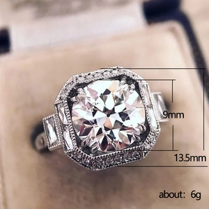 Anillo vintage de cobre plateado con circonita de 9mm en un engaste halo octogonal