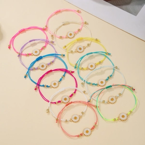 Set of 12 colorful braided sunflower bracelets in various vibrant bohemian styles