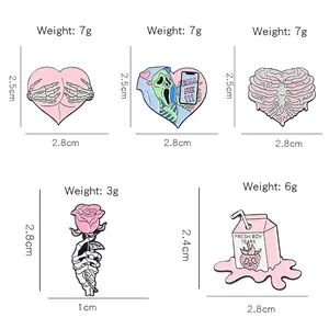 Pink enamel skeleton brooches set with heart and rose motifs for punk fashion styles