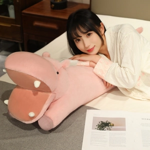 Pink cartoon hippo plush body pillow with closed eyes, soft long bolster for sleeping