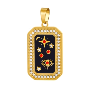 Detailed macro view of a gold rectangular pendant with star motifs and zircon borders