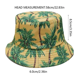 Vista dettagliata del cappello a secchiello giallo con palme e misura di 58cm testa