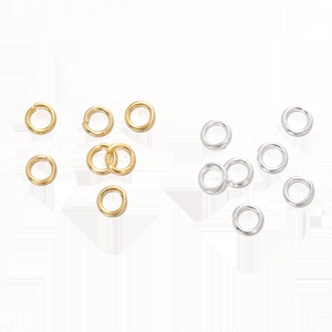 Top view of gold and silver jump rings for DIY jewelry making and bracelet repairs