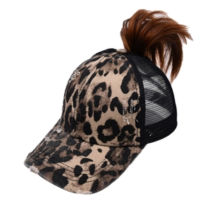 Distressed leopard print baseball cap with long brown hair extension and mesh back