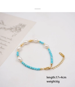 Detail view of turquoise and freshwater pearl bracelet with 17+4cm length measurement