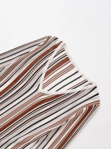 Detail of the V-neckline and fine striped texture on this linen-blend knit sweater