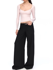 Pink slim fit U-neck long sleeve T-shirt paired with black wide-leg high-waisted trousers