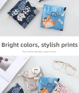 Detail of portable cotton menstrual pad pouches with cute cat and floral prints