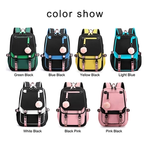 Griglia di zaini in nylon resistente in sette vivaci combinazioni di colori con pon pon