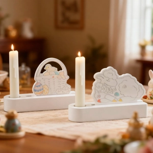 Easter candle holder set with sheep and egg basket designs on minimalist white bases