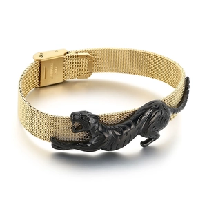 Gold stainless steel mesh bracelet featuring a black cheetah charm in a climbing pose