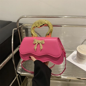 Pink bow handbag with wavy edges and irregular gold metal handle for women