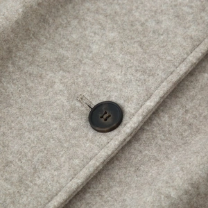 British style beige wool coat with high-quality texture and dark round button detail
