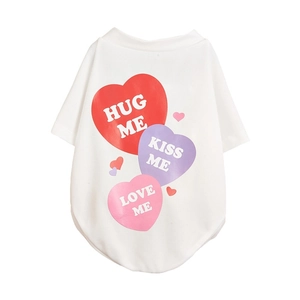 Detail of white mesh pet t-shirt with heart prints and Hug Me Kiss Me text