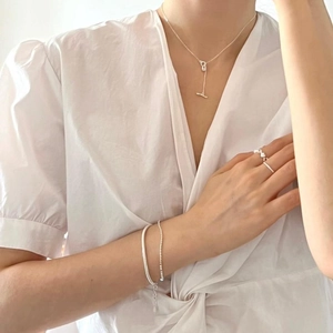 Minimalist 925 sterling silver jewelry set featuring geometric bar necklace and bracelets