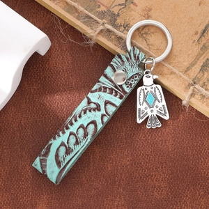 Vintage leather keychain with embossed pattern and eagle metal pendant with turquoise stone