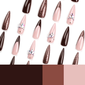 Long almond press-on nails in coffee brown and glitter with rhinestones on white background