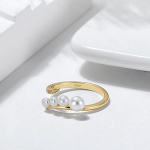Macro shot of S925 sterling silver ring with natural pearls and zircon stones