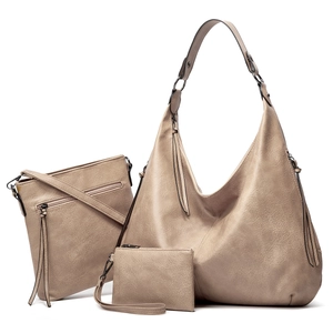 Three-piece apricot PU leather handbag set showing tote, crossbody bag, and clutch wallet