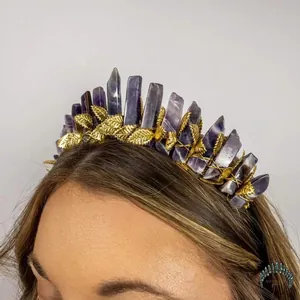 Detailed view of handmade purple amethyst crown with golden leaf accents for women