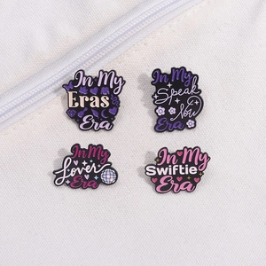Set of 4 Taylor Swift inspired enamel pins including Eras Tour and Lover designs