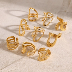 9-piece gold stainless steel ring set with irregular wave patterns and zircon stones