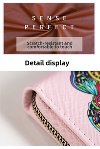 Close-up of pink PU leather wallet showing floral pattern and golden zipper detail