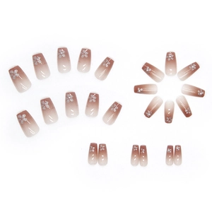 Gradient press-on nails with silver glitter floral patterns and pearl accents