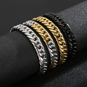 Classic stainless steel Cuban link bracelets in silver, gold, and black finishes for couples