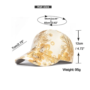 Detail view of cream baseball cap with gold jacquard flowers and 7cm brim measurements