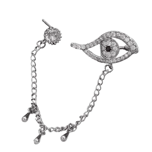 Detailed view of silver evil eye ear cuff with white zircon stones and drop pendants