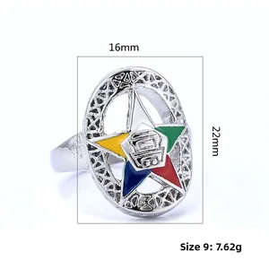 Macro view of Order of the Eastern Star ring showing colorful enamel and engraved emblem