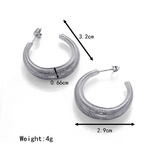 Vintage silver stainless steel C-shaped spring hoop earrings for women with spiral texture