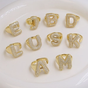 18k gold plated bubble letter rings with sparkling zircon pavé in an adjustable open design
