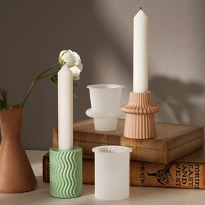 Modern geometric resin candle holder with striped patterns for minimalist home decor