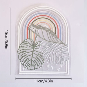Rainbow suncatcher window film with monstera leaves measuring 11cm x 15cm