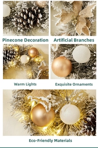 Close-up of Christmas wreath with pine cones, burlap petals and warm LED light details
