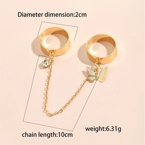 Detail showing gold butterfly ring and chain dimensions with 2cm diameter and 10cm length